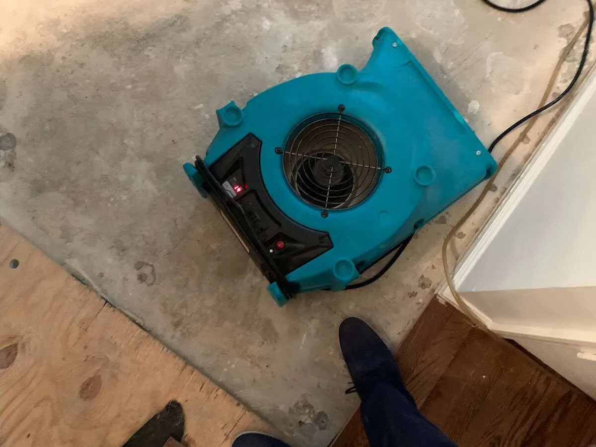 Air mover drying subfloor during Leak Detection & Repair in Ruidoso